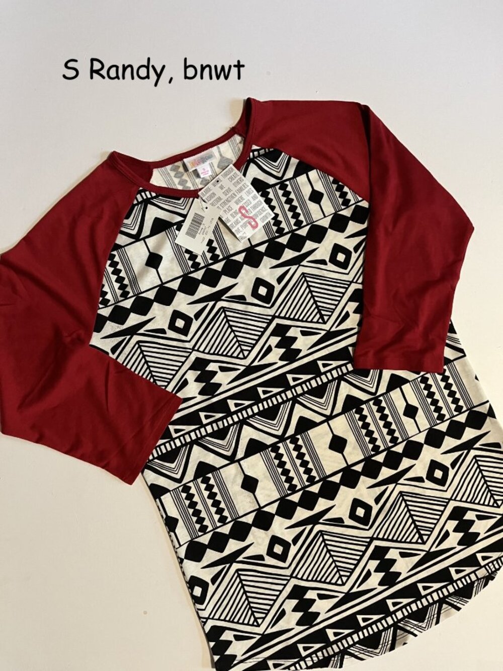 Small Lularoe Randy unisex raglan jersey top, black white tribal, red sleeves